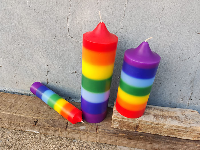 layered rainbow pillar candle