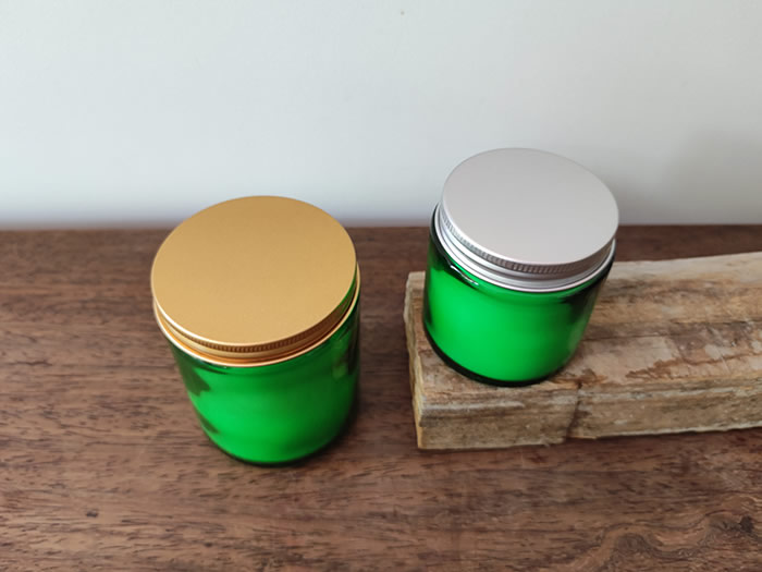 green glass jar candles