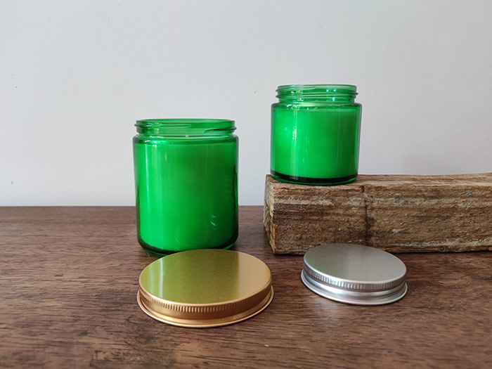 green glass jar candles